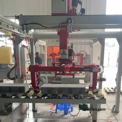 Máquina de sujeción automática de carga y descarga de cargas pesadas